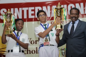 DPSI - The Principal of DPS International, Mr. David Raj handing over winners' trophies